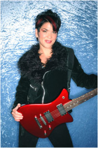 Leslie Stoddard, rhythm and lead guitarist for Gia's Fix with her Farnell Millennium