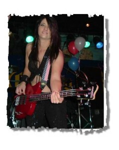 Kim Martin, accomplished bassist, singer & recording artist playing one of her EXB-4 Custom Pro series